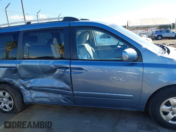 2008 Kia Sedona LX with VIN KNDMB233986218153, listed as a IAAI auction lot 41671096 with 144,933 mi miles. Bid and sale history available at carsss.com. Image 13.