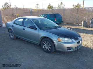 2004 Dodge Stratus SE with VIN 1B3EL36X24N267301, listed as a IAAI auction lot 41402238 with 143,579 mi miles. Bid and sale history available at carsss.com. Image 1.