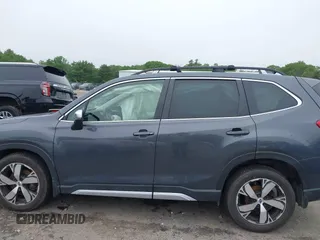 2021 Subaru Forester Touring z VIN JF2SKAXC8MH477969, wystawiony jako IAAI lot #42461540 z przebiegiem 29 143 mil mil oraz . Historia ofert i sprzedaży dostępna na DreamBid. Obrazek 15.