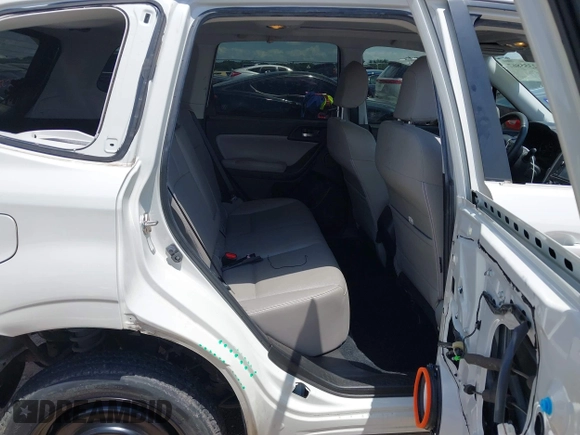 2015 Subaru Forester Touring with VIN JF2SJAWC0FH806493, listed as a IAAI auction lot 42355867 with 128,937 mi miles and . Bid and sale history available at DreamBid. Image 8.