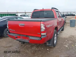 2015 Toyota Tacoma with VIN 3TMLU4EN8FM189953, listed as a IAAI auction lot 41584110 with 126,833 mi miles and . Bid and sale history available at DreamBid. Image 4.