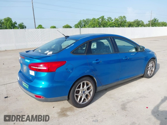 2015 Ford Focus SE with VIN 1FADP3F21FL326927, listed as a IAAI auction lot 42628577 with 112,199 mi miles and . Bid and sale history available at DreamBid. Image 4.
