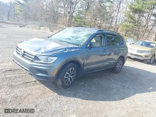 2021 Volkswagen Tiguan S with VIN 3VV1B7AX1MM005781, listed as a IAAI auction lot 40768656 with 48,109 mi miles. Bid and sale history available at carsss.com. Image 2.