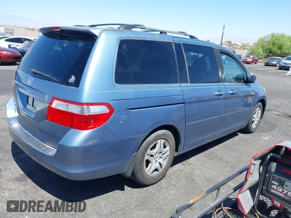 2006 Honda Odyssey EX with VIN 5FNRL38466B065601, listed as a IAAI auction lot 42559342 with 258,995 mi miles and . Bid and sale history available at DreamBid. Image 4.