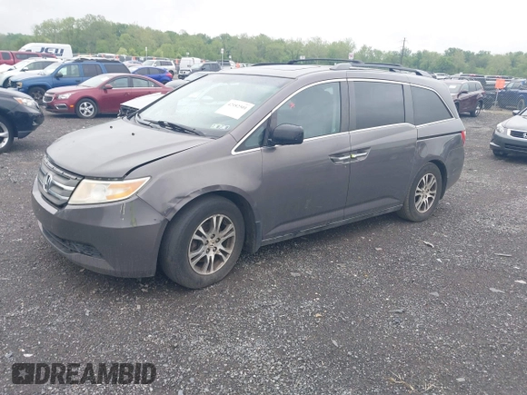 2012 Honda Odyssey EX-L with VIN 5FNRL5H64CB060468, listed as a IAAI auction lot 42182501 with 236,399 mi miles and . Bid and sale history available at carsss.com. Image 17.