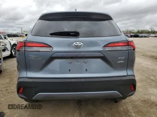 2023 Toyota Corolla Cross XLE with VIN 7MUDAABG1PV052040, listed as a Copart auction lot 51840315 with 43,228 mi miles and Salvage title. Bid and sale history available at DreamBid. Image 6.