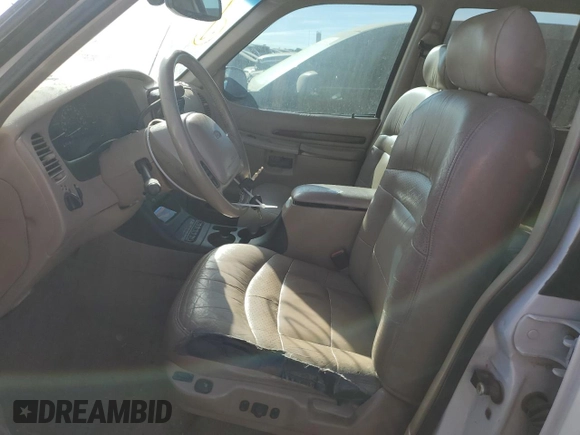 1999 Ford Explorer XLT z VIN 1FMZU34E8XZA16029, wystawiony jako Copart lot #83857034 z przebiegiem 188 329 mil mil oraz Szkoda całkowita • Salvage title. Historia ofert i sprzedaży dostępna na DreamBid. Obrazek 7.