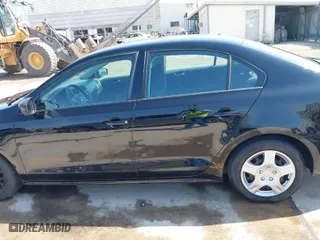 2014 Volkswagen Jetta Sedan S with VIN 3VW2K7AJ9EM386678, listed as a IAAI auction lot 41833784 with 98,390 mi miles. Bid and sale history available at carsss.com. Image 14.