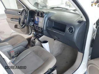 2014 Jeep Patriot High Altitude with VIN 1C4NJPFA1ED653402, listed as a IAAI auction lot 42371410 with 165,459 mi miles and . Bid and sale history available at DreamBid. Image 5.