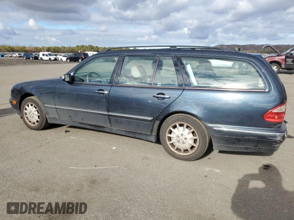 2001 Mercedes-Benz E-Class AWD with VIN WDBJH82J81X052002, listed as a Copart auction lot 82832724 with 187,464 mi miles and Salvage Title. Bid and sale history available at carsss.com. Image 2.