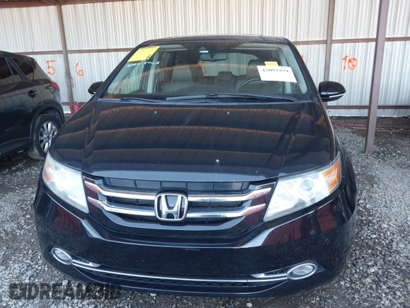 2014 Honda Odyssey Touring with VIN 5FNRL5H94EB110590, listed as a IAAI auction lot 42092929 with 242,338 mi miles and . Bid and sale history available at DreamBid. Image 13.
