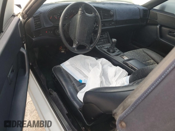 1990 Porsche 944 with VIN WP0CB2949LN481351, listed as a Copart auction lot 75335194 with 70,964 mi miles and Salvage title. Bid and sale history available at DreamBid. Image 8.