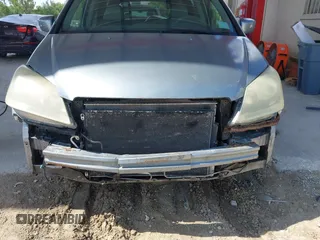 2007 Honda Odyssey EX-L z VIN 5FNRL38657B116038, wystawiony jako IAAI lot #42365429 z przebiegiem 177 518 mil mil oraz . Historia ofert i sprzedaży dostępna na DreamBid. Obrazek 6.