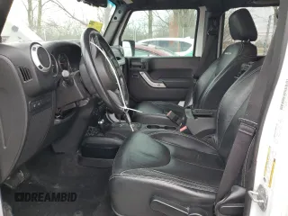 2014 Jeep Wrangler Unlimited Rubicon с VIN 1C4BJWFG9EL150370, выставлен на аукционе Copart как лот 49917075 с пробегом 110 756 миль миль и Списание • Salvage title. История ставок и продаж доступна на DreamBid. Изображение 7.