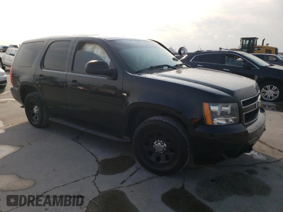 2013 Chevrolet Tahoe Commercial with VIN 1GNLC2E00DR304026, listed as a Copart auction lot 57041135 with 125,087 mi miles and Salvage title. Bid and sale history available at DreamBid. Image 4.