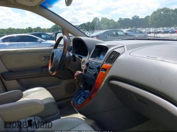 2002 Lexus RX 300 with VIN JTJGF10U920133281, listed as a IAAI auction lot 38054792 with 220,304 mi miles and . Bid and sale history available at DreamBid. Image 5.