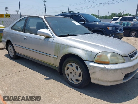 1997 Honda Civic EX z VIN 1HGEJ8146VL015936, wystawiony jako IAAI lot #42461577 z przebiegiem 267 563 mil mil oraz . Historia ofert i sprzedaży dostępna na DreamBid. Obrazek 1.
