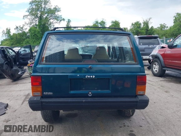 1996 Jeep Cherokee SE z VIN 1J4FJ28S8TL285634, wystawiony jako IAAI lot #42183816 z przebiegiem 260 237 mil mil oraz . Historia ofert i sprzedaży dostępna na DreamBid. Obrazek 16.