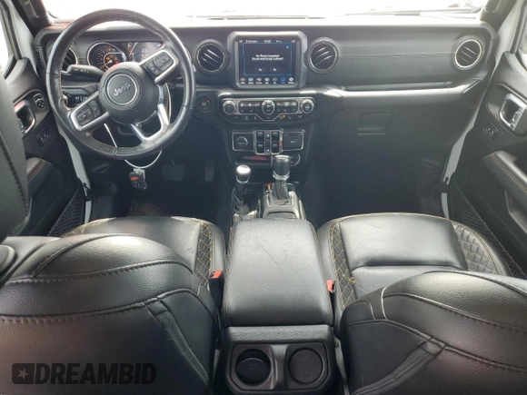 2021 Jeep Wrangler Unlimited Sahara Altitude with VIN 1C4HJXEG1MW586273, listed as a Copart auction lot 61723485 with 76,236 mi miles and Salvage title. Bid and sale history available at DreamBid. Image 8.