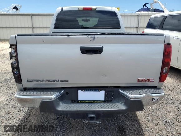 2010 GMC Canyon SLE1 with VIN 1GTJTCDE3A8118842, listed as a Copart auction lot 56239205 with 132,586 mi miles and Clean title. Bid and sale history available at DreamBid. Image 6.