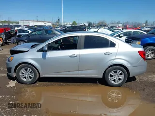2013 Chevrolet Sonic LT with VIN 1G1JC5SHXD4185418, listed as a IAAI auction lot 41988445 with 177,696 mi miles. Bid and sale history available at carsss.com. Image 14.