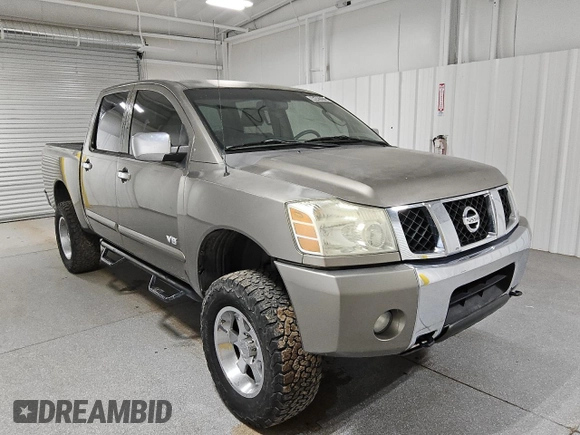 2006 Nissan Titan LE z VIN 1N6AA07BX6N573134, wystawiony jako Copart lot #46487815 z przebiegiem 161 174 mil mil oraz Czysty tytuł • Clean title. Historia ofert i sprzedaży dostępna na DreamBid. Obrazek 4.