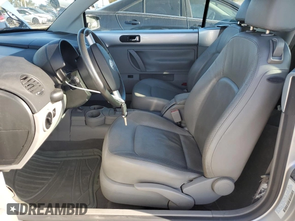 2004 Volkswagen Beetle with VIN 3VWCM21Y34M300701, listed as a Copart auction lot 77567344 with 91,236 mi miles and Salvage Title. Bid and sale history available at DreamBid. Image 7.