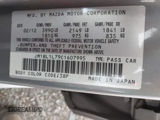 2012 Mazda 3 i Touring with VIN JM1BL1L79C1607995, listed as a IAAI auction lot 42254595 with 203,809 mi miles and . Bid and sale history available at DreamBid. Image 9.