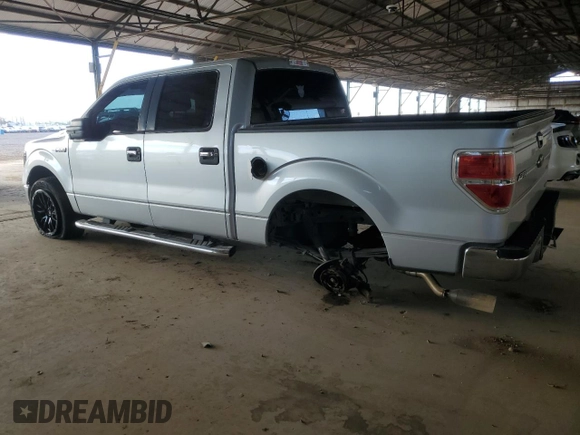 2012 Ford F-150 XL with VIN 1FTFW1EF1CKE10648, listed as a Copart auction lot 63333505 with 160,764 mi miles and Salvage title. Bid and sale history available at DreamBid. Image 2.