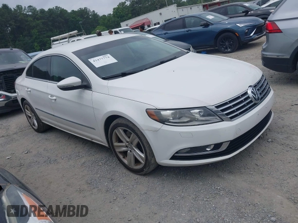 2014 Volkswagen CC R-Line with VIN WVWBP7AN7EE534565, listed as a IAAI auction lot 42477774 with 85,539 mi miles and . Bid and sale history available at DreamBid. Image 1.