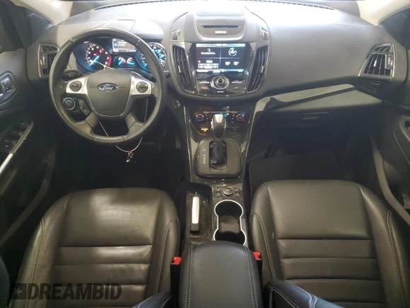 2015 Ford Escape Titanium z VIN 1FMCU9J97FUC04911, wystawiony jako Copart lot #62403715 z przebiegiem 211 354 mil mil oraz Czysty tytuł • Clean title. Historia ofert i sprzedaży dostępna na DreamBid. Obrazek 8.