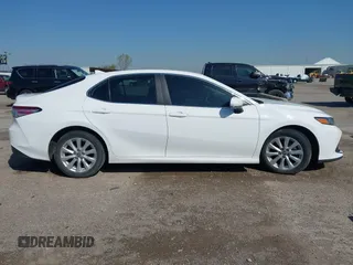 2019 Toyota Camry LE with VIN 4T1B11HK9KU825107, listed as a IAAI auction lot 41971159 with 15,802 mi miles and . Bid and sale history available at DreamBid. Image 13.