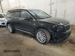 2024 Cadillac XT6 AWD Premium Luxury with VIN 1GYKPDRS8RZ706118, listed as a Copart auction lot 50127425 with 36,025 mi miles and Salvage Title. Bid and sale history available at DreamBid. Image 4.