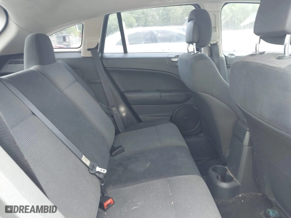 2012 Dodge Caliber SXT with VIN 1C3CDWDA6CD510605, listed as a IAAI auction lot 42104688 with 221,059 mi miles. Bid and sale history available at carsss.com. Image 8.