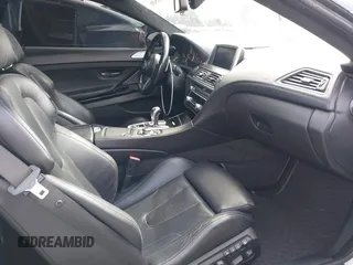 2013 BMW M6 z VIN WBSLX9C50DC968892, wystawiony jako IAAI lot #41935486 z przebiegiem 105 736 mil mil oraz . Historia ofert i sprzedaży dostępna na DreamBid. Obrazek 5.