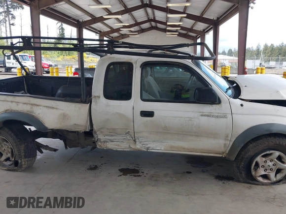 2001 Toyota Tacoma z VIN 5TEWN72N11Z733480, wystawiony jako IAAI lot #42244484 z przebiegiem 323 454 mil mil oraz . Historia ofert i sprzedaży dostępna na DreamBid. Obrazek 14.