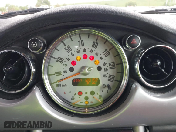 2006 MINI Convertible S with VIN WMWRH33556TL93023, listed as a IAAI auction lot 42744691 with 128,192 mi miles and . Bid and sale history available at DreamBid. Image 7.