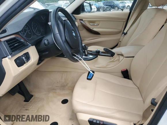 2014 BMW 3 Series 320i xDrive with VIN WBA3C3G50ENS67198, listed as a Copart auction lot 61654205 with 86,126 mi miles and Salvage title. Bid and sale history available at DreamBid. Image 7.