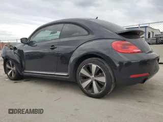 2012 Volkswagen Beetle 2.0T Turbo w/Sun/Sound with VIN 3VWV67AT2CM664806, listed as a Copart auction lot 86595164 with 158,239 mi miles and Salvage Title. Bid and sale history available at carsss.com. Image 2.