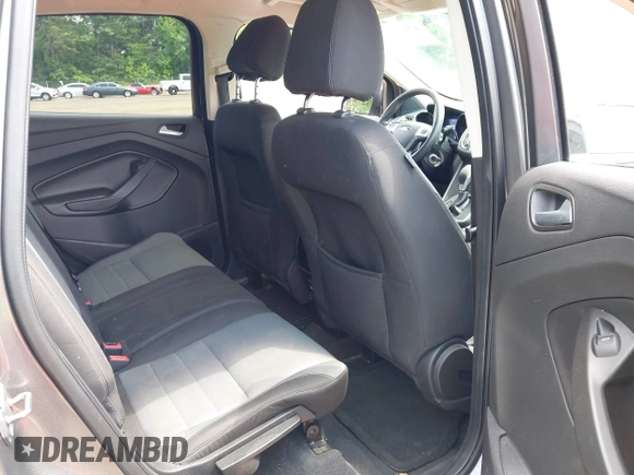2013 Ford Escape SE z VIN 1FMCU0G9XDUB65263, wystawiony jako IAAI lot #42465579 z przebiegiem 196 751 mil mil oraz . Historia ofert i sprzedaży dostępna na DreamBid. Obrazek 8.
