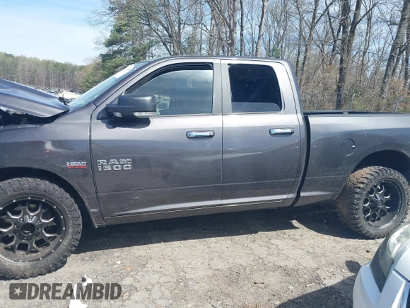 2015 Ram 1500 Big Horn z VIN 1C6RR7GT8FS549293, wystawiony jako IAAI lot #41833000 z przebiegiem Nie podano mil oraz . Historia ofert i sprzedaży dostępna na DreamBid. Obrazek 13.