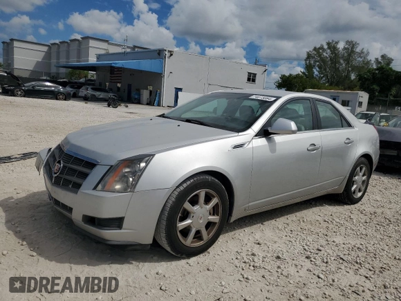 2009 Cadillac CTS RWD w/1SA with VIN 1G6DF577690145964, listed as a Copart auction lot 74073064 with 103,788 mi miles and Salvage Title. Bid and sale history available at carsss.com. Image 1.