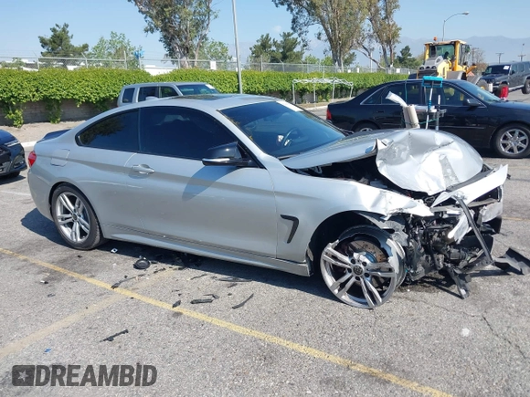 2014 BMW 4 Series 428i xDrive with VIN WBA3N9C54EF721188, listed as a IAAI auction lot 42143305 with Not provided miles and . Bid and sale history available at DreamBid. Image 1.