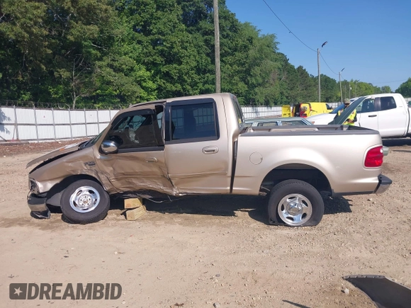 2001 Ford F-150 XLT with VIN 1FTRW07W11KD96140, listed as a IAAI auction lot 42331842 with Not provided miles and . Bid and sale history available at DreamBid. Image 14.