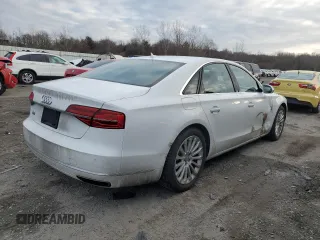 2015 Audi A8 z VIN WAUJGAFD9FN003570, wystawiony jako Copart lot #87642905 z przebiegiem 71 523 mil mil oraz Czysty tytuł • Clean title. Historia ofert i sprzedaży dostępna na DreamBid. Obrazek 3.