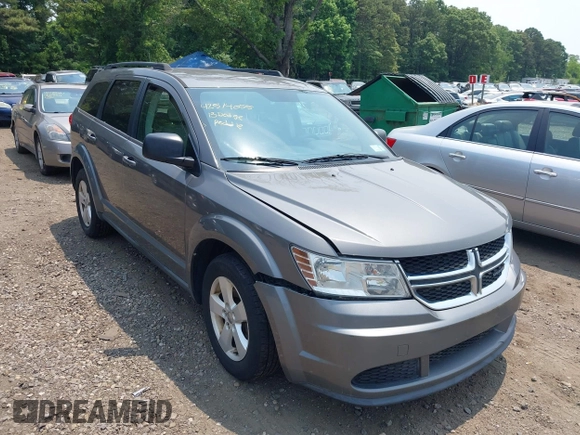 2013 Dodge Journey American Value z VIN 3C4PDCAB0DT691429, wystawiony jako IAAI lot #42514055 z przebiegiem 213 593 mil mil oraz . Historia ofert i sprzedaży dostępna na DreamBid. Obrazek 6.