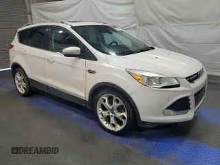 2014 Ford Escape Titanium with VIN 1FMCU9JX0EUB48372, listed as a Copart auction lot 48600505 with 192,639 mi miles and Clean Title. Bid and sale history available at carsss.com. Image 4.