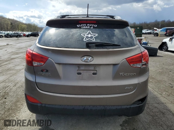 2011 Hyundai Tucson Limited with VIN KM8JUCAC2BU200517, listed as a Copart auction lot 53252005 with 158,502 mi miles and Salvage Title. Bid and sale history available at DreamBid. Image 6.