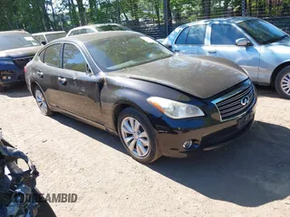 2011 Infiniti M with VIN JN1BY1APXBM324672, listed as a IAAI auction lot 42214163 with 187,424 mi miles. Bid and sale history available at carsss.com. Image 1.