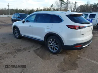 2016 Mazda CX-9 Grand Touring z VIN JM3TCADY4G0124588, wystawiony jako IAAI lot #41192549 z przebiegiem 161 272 mil mil oraz . Historia ofert i sprzedaży dostępna na DreamBid. Obrazek 3.